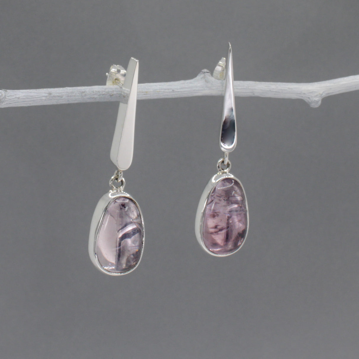 Saha - Triangle Amethyst Silver Earrings - Stud Curated and designed by Emilio Sotelo Jewelry for Croi Kinsale Jewellery in Kinsale West Cork Ireland Europe. Find exceptional handmade silver and gold jewellery at affordable prices for birthday gifts and Christmas presents. Handcrafted Silver jewelry. Find the best affordable jewellery