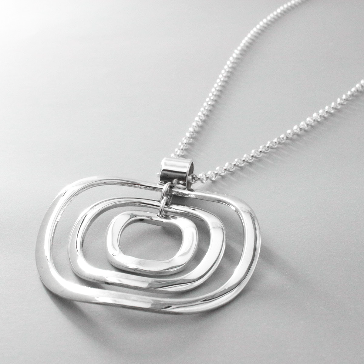 AYA - Multi Circle Silver Pendant Curated and designed by Emilio Sotelo Jewelry for Croi Kinsale Jewellery in Kinsale West Cork Ireland Europe. Find exceptional handmade silver and gold jewellery at affordable prices for birthday gifts and Christmas presents. Find Irish designers and makers. Beautiful jewellery shop located in Kinsale, Co. Cork.