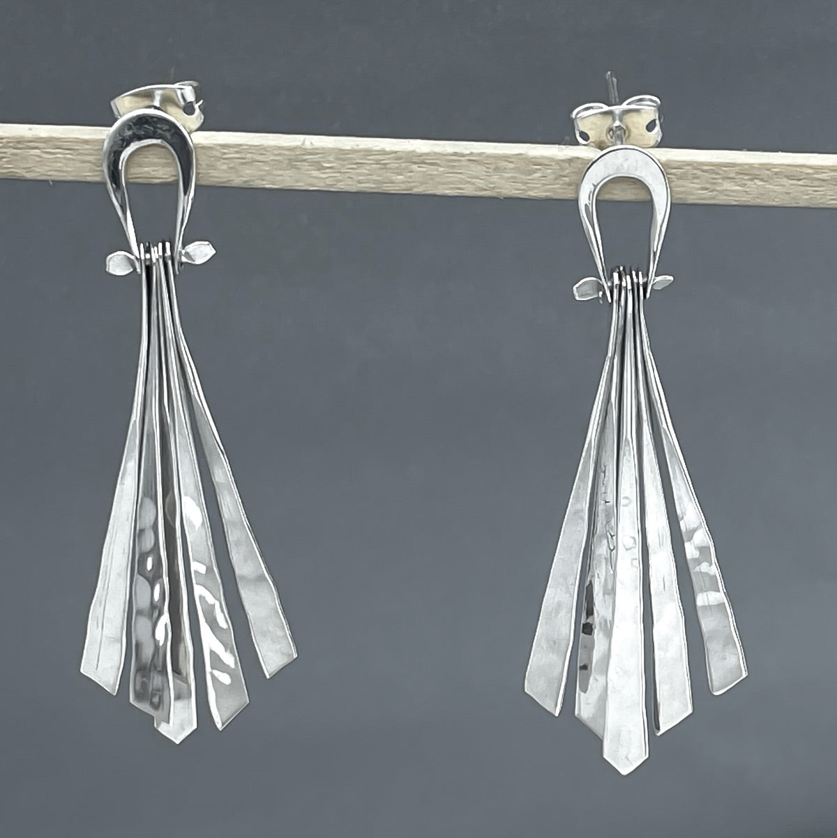 Áine Luminous Dangling Diamond-Shape Hammered Silver Stud Earrings