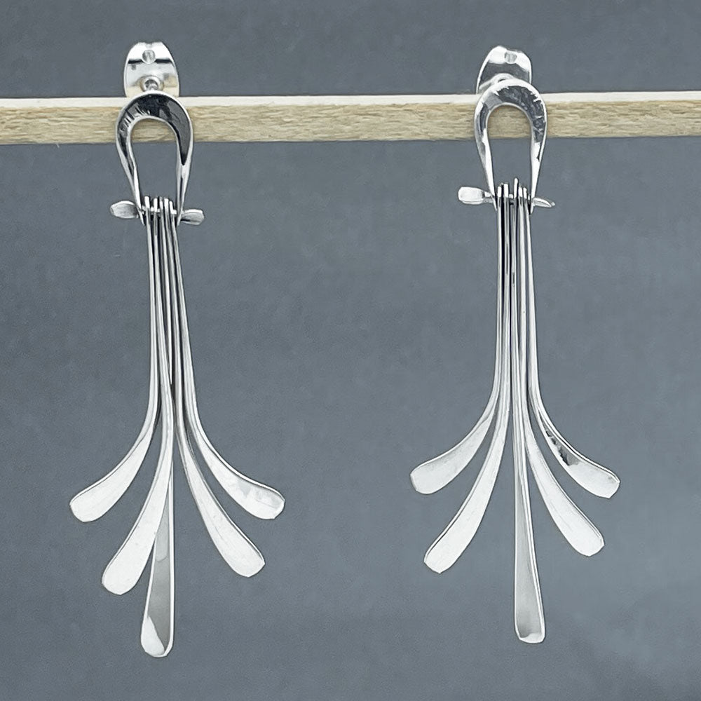 Áine Luminous Dangling Fleur de Lys Silver Stud Earrings