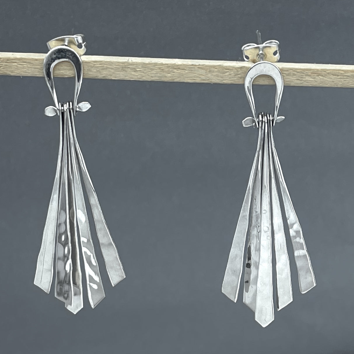 Áine Luminous Dangling Diamond-Shape Hammered Silver Stud Earrings