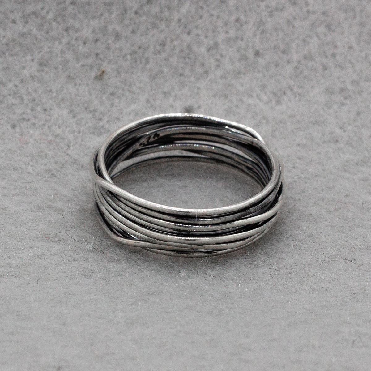 Aran - Lasso S Oxidised Silver Silver Ring Curated and designed by Emilio Sotelo Jewelry for Croi Kinsale Jewellery in Kinsale West Cork Ireland Europe. Find exceptional handmade silver and gold jewellery at affordable prices for birthday gifts and Christmas presents. Handcrafted Silver jewelry. Find the best affordable jewellery - Size 11