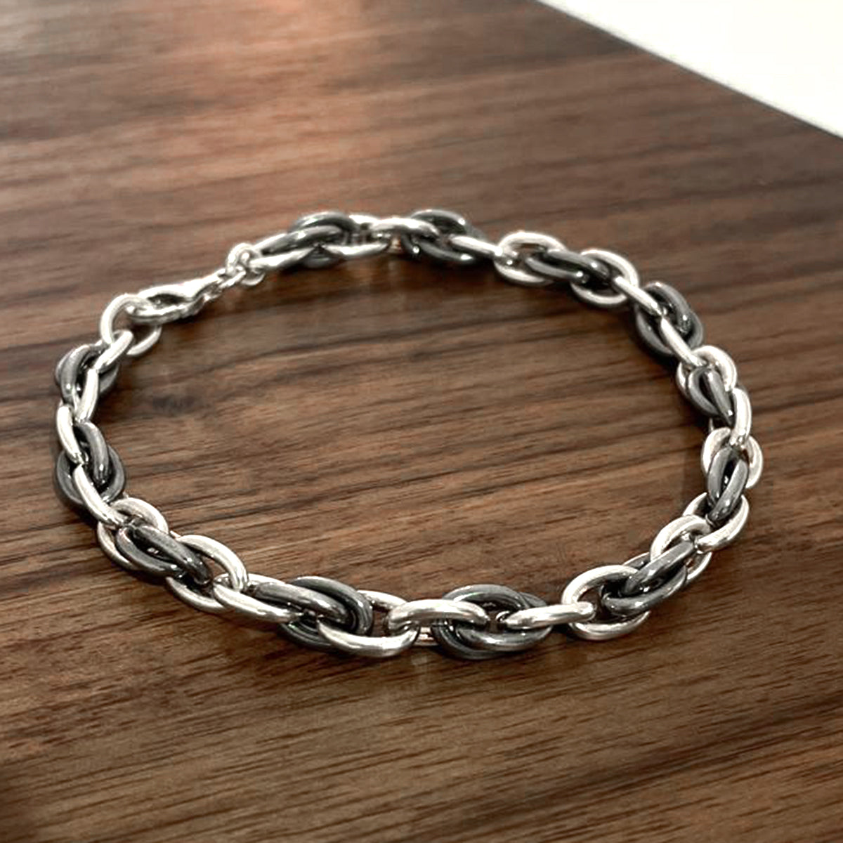 Aran Oxidised Triple Interlock Silver Bracelet