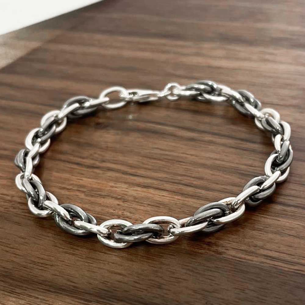 Aran Oxidised Triple Interlock Silver Bracelet