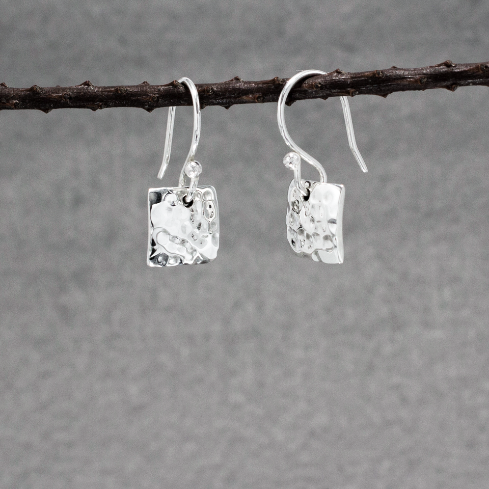 Small Artemis Hammered Square Silver Earrings Dangle Details: Dimensions: 10 mm long by 10 mm wide (approximately 3/8 inches long by 3/8 inches wide) Sterling silver French wire Material: .950 sterling silver Finish: Hammered silver