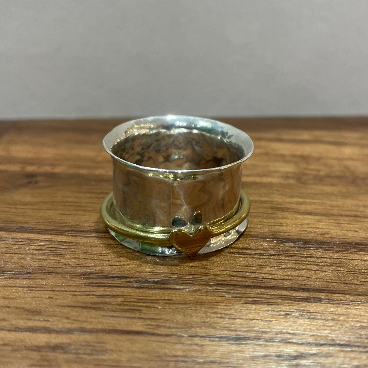 Tara Spinning Silver Ring with Brass Heart Band