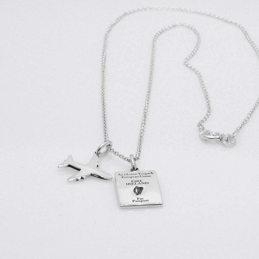 Our Irish Passport Mini Replica Silver Pendant captures all the intricate details of an Irish passport cover. Meticulously crafted from sterling silver, it boasts a dazzling high-polished finish. 🇮🇪✈️ Dimensions: Passport: 10mm wide by 14mm high Airplane: 14mm wide by 14mm high Bail: Fits up to a 2.5mm chain for versatile wear. Chain: Includes a 1.4mm sterling silver belcher Rolo chain, available in various lengths to suit your style preference.