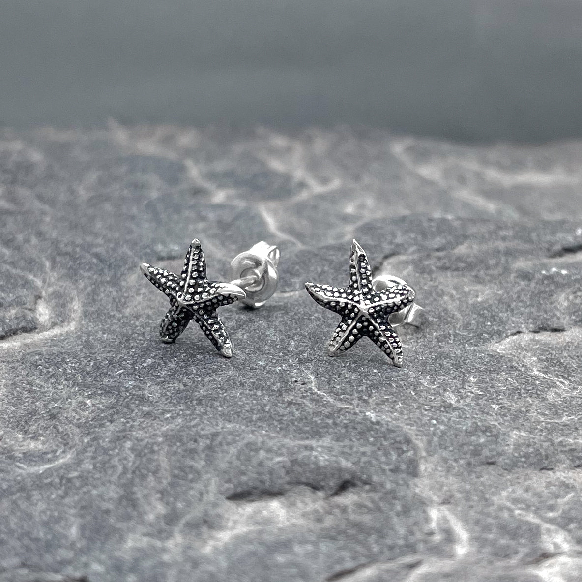 Uisce Tiny Starfish Textured Oxidised Silver Stud Earrings