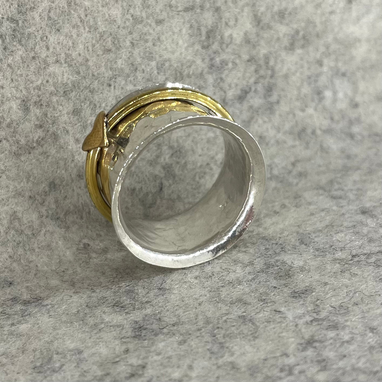 Tara Spinning Silver Ring with Brass Heart Band
