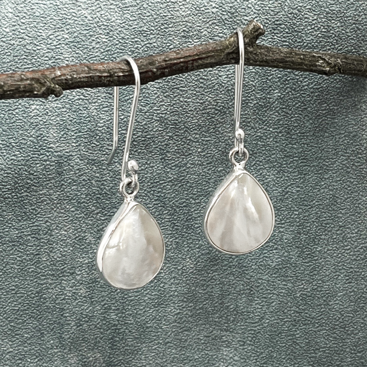 Pearla - Small Mother of Pearl Drop Silver Earrings - Dangle Curated and designed by Emilio Sotelo Jewelry for Croi Kinsale Jewellery in Kinsale West Cork Ireland Europe. Find exceptional handmade silver and gold jewellery at affordable prices for birthday gifts and Christmas presents. Handcrafted Silver jewelry. Find the best affordable jewellery