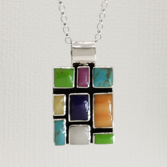 Sleveen - Rectangle With Multi-Coloured Mosaic Resin Silver Pendant Curated and designed by Emilio Sotelo Jewelry for Croi Kinsale Jewellery in Kinsale West Cork Ireland Europe. Find exceptional handmade silver and gold jewellery at affordable prices for birthday gifts and Christmas presents. Find Irish designers and makers. Beautiful jewellery shop located in Kinsale, Co. Cork.