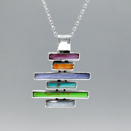Sleveen - Multi-coloured Kinsale Steps - Silver Pendant Curated and designed by Emilio Sotelo Jewelry for Croi Kinsale Jewellery in Kinsale West Cork Ireland Europe. Find exceptional handmade silver and gold jewellery at affordable prices for birthday gifts and Christmas presents. Find Irish designers and makers. Beautiful jewellery shop located in Kinsale, Co. Cork.