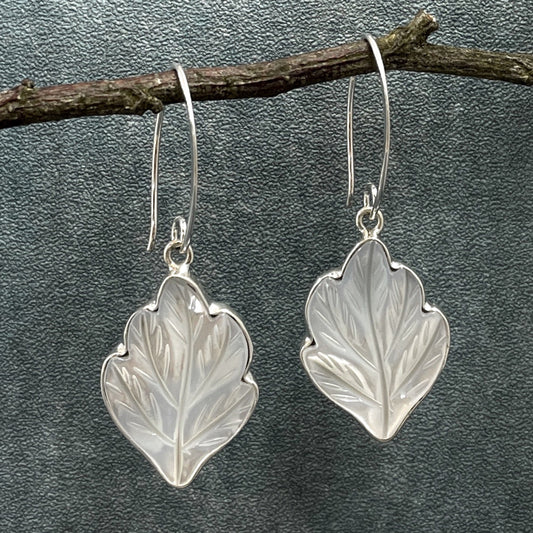 Pearla - Carved Mother of Pearl Leaf Silver Earrings - Dangle Curated and designed by Emilio Sotelo Jewelry for Croi Kinsale Jewellery in Kinsale West Cork Ireland Europe. Find exceptional handmade silver and gold jewellery at affordable prices for birthday gifts and Christmas presents. Handcrafted Silver jewelry. Find the best affordable jewellery