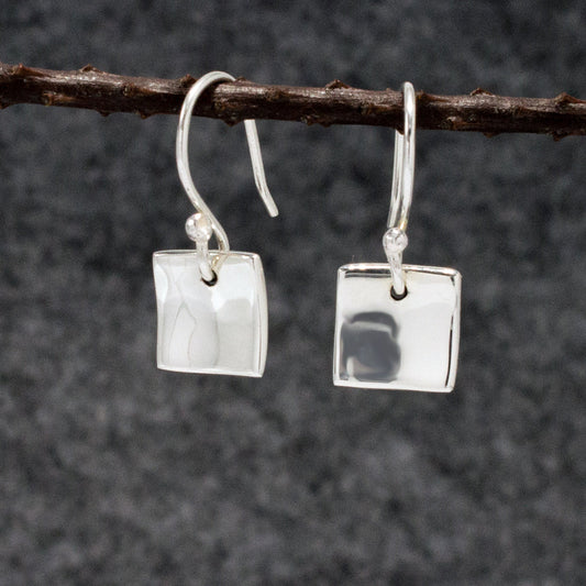 Selene - Small Dapped Square Silver Earrings - Dangle Curated and designed by Emilio Sotelo Jewelry for Croi Kinsale Jewellery in Kinsale West Cork Ireland Europe. Find exceptional handmade silver and gold jewellery at affordable prices for birthday gifts and Christmas presents. Handcrafted Silver jewelry. Find the best affordable jewellery