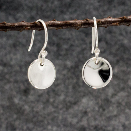 Selene - Small Dapped Disc Silver Earrings - Dangle Curated and designed by Emilio Sotelo Jewelry for Croi Kinsale Jewellery in Kinsale West Cork Ireland Europe. Find exceptional handmade silver and gold jewellery at affordable prices for birthday gifts and Christmas presents. Handcrafted Silver jewelry. Find the best affordable jewellery
