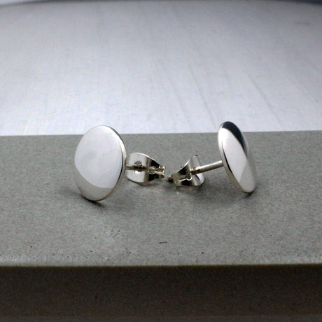 Artemis - Small Disc Silver Earrings - Stud Curated and designed by Emilio Sotelo Jewelry for Croi Kinsale Jewellery in Kinsale West Cork Ireland Europe. Find exceptional handmade silver and gold jewellery at affordable prices for birthday gifts and Christmas presents. Handcrafted Silver jewelry. Find the best affordable jewellery