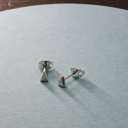 Piccoli - Tiny Triangle Tiny Silver Earrings - Stud Curated and designed by Emilio Sotelo Jewelry for Croi Kinsale Jewellery in Kinsale West Cork Ireland Europe. Find exceptional handmade silver and gold jewellery at affordable prices for birthday gifts and Christmas presents. Handcrafted Silver jewelry. Find the best affordable jewellery