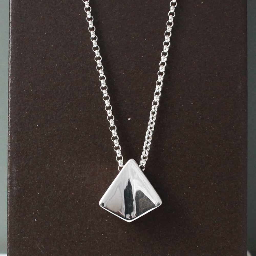 Saha - KITE Silver Pendant Curated and designed by Emilio Sotelo Jewelry for Croi Kinsale Jewellery in Kinsale West Cork Ireland Europe. Find exceptional handmade silver and gold jewellery at affordable prices for birthday gifts and Christmas presents. Find Irish designers and makers. Beautiful jewellery shop located in Kinsale, Co. Cork.