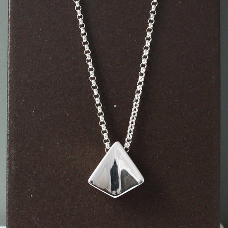 Saha - KITE Silver Pendant Curated and designed by Emilio Sotelo Jewelry for Croi Kinsale Jewellery in Kinsale West Cork Ireland Europe. Find exceptional handmade silver and gold jewellery at affordable prices for birthday gifts and Christmas presents. Find Irish designers and makers. Beautiful jewellery shop located in Kinsale, Co. Cork.