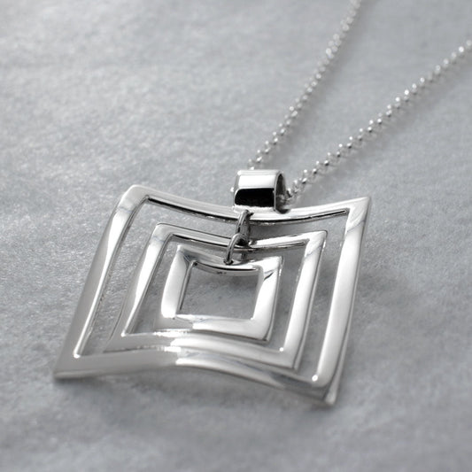 AYA - Multi Square Silver Pendant Curated and designed by Emilio Sotelo Jewelry for Croi Kinsale Jewellery in Kinsale West Cork Ireland Europe. Find exceptional handmade silver and gold jewellery at affordable prices for birthday gifts and Christmas presents. Find Irish designers and makers. Beautiful jewellery shop located in Kinsale, Co. Cork.