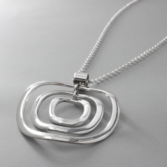 AYA - Multi Circle Silver Pendant Curated and designed by Emilio Sotelo Jewelry for Croi Kinsale Jewellery in Kinsale West Cork Ireland Europe. Find exceptional handmade silver and gold jewellery at affordable prices for birthday gifts and Christmas presents. Find Irish designers and makers. Beautiful jewellery shop located in Kinsale, Co. Cork.
