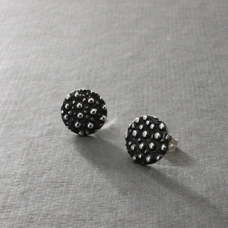 Firmament - Small Disc Oxidised Silver Earrings - Stud Curated and designed by Emilio Sotelo Jewelry for Croi Kinsale Jewellery in Kinsale West Cork Ireland Europe. Find exceptional handmade silver and gold jewellery at affordable prices for birthday gifts and Christmas presents. Handcrafted Silver jewelry. Find the best affordable jewellery