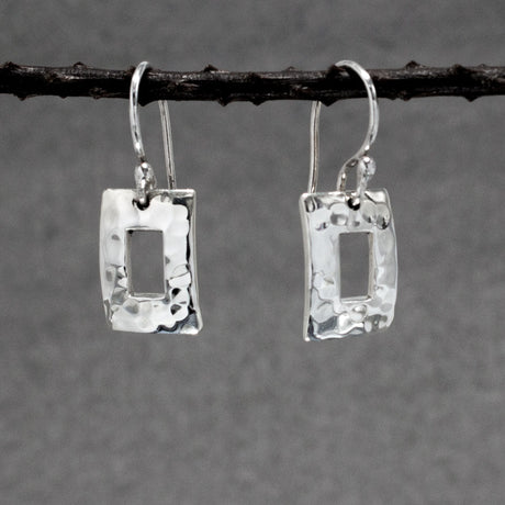 Artemis - Small Off-Center Rectangle Hammered Silver Earrings - Dangle Curated and designed by Emilio Sotelo Jewelry for Croi Kinsale Jewellery in Kinsale West Cork Ireland Europe. Find exceptional handmade silver and gold jewellery at affordable prices for birthday gifts and Christmas presents. Handcrafted Silver jewelry. Find the best affordable jewellery