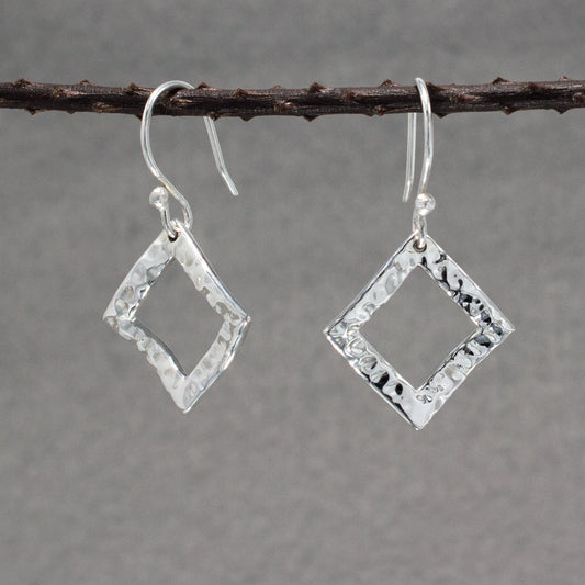 AYA - Rhombus Hammered Silver Earrings - Dangle Curated and designed by Emilio Sotelo Jewelry for Croi Kinsale Jewellery in Kinsale West Cork Ireland Europe. Find exceptional handmade silver and gold jewellery at affordable prices for birthday gifts and Christmas presents. Handcrafted Silver jewelry. Find the best affordable jewellery