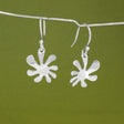 Moineir - Small Urban Flower Silver Earrings - Dangle Curated and designed by Emilio Sotelo Jewelry for Croi Kinsale Jewellery in Kinsale West Cork Ireland Europe. Find exceptional handmade silver and gold jewellery at affordable prices for birthday gifts and Christmas presents. Handcrafted Silver jewelry. Find the best affordable jewellery