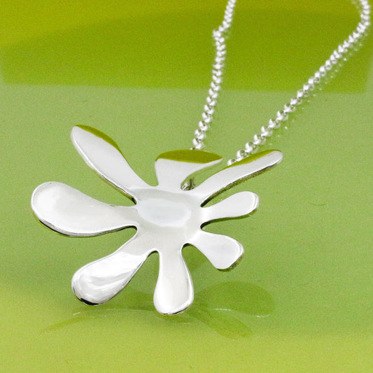 Moineir - Urban Flower Silver Pendant Curated and designed by Emilio Sotelo Jewelry for Croi Kinsale Jewellery in Kinsale West Cork Ireland Europe. Find exceptional handmade silver and gold jewellery at affordable prices for birthday gifts and Christmas presents. Find Irish designers and makers. Beautiful jewellery shop located in Kinsale, Co. Cork.