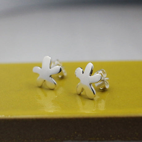 Moineir - Small Daisy Silver Earrings - Stud Curated and designed by Emilio Sotelo Jewelry for Croi Kinsale Jewellery in Kinsale West Cork Ireland Europe. Find exceptional handmade silver and gold jewellery at affordable prices for birthday gifts and Christmas presents. Handcrafted Silver jewelry. Find the best affordable jewellery