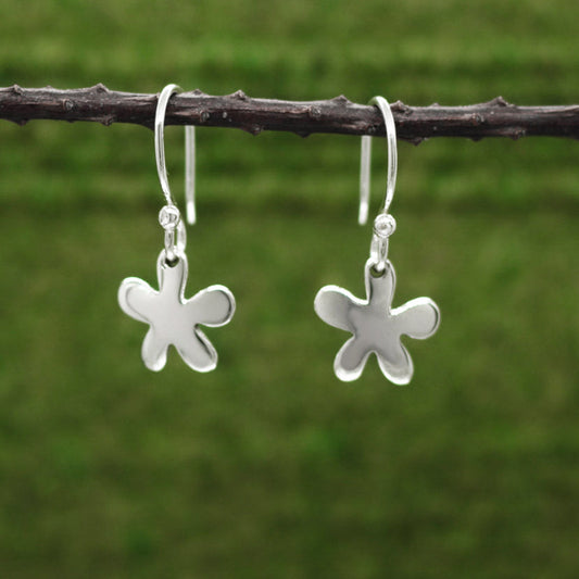 Moineir - Small Daisy Silver Earrings - Dangle Curated and designed by Emilio Sotelo Jewelry for Croi Kinsale Jewellery in Kinsale West Cork Ireland Europe. Find exceptional handmade silver and gold jewellery at affordable prices for birthday gifts and Christmas presents. Handcrafted Silver jewelry. Find the best affordable jewellery