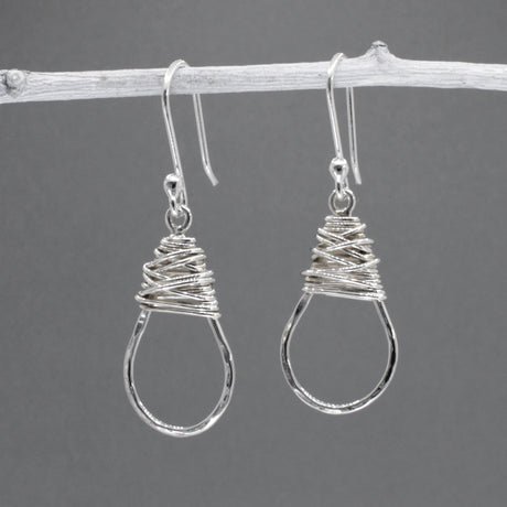 Saha - Small Oval & Wire Wrap Silver Earrings - Dangle Curated and designed by Emilio Sotelo Jewelry for Croi Kinsale Jewellery in Kinsale West Cork Ireland Europe. Find exceptional handmade silver and gold jewellery at affordable prices for birthday gifts and Christmas presents. Handcrafted Silver jewelry. Find the best affordable jewellery