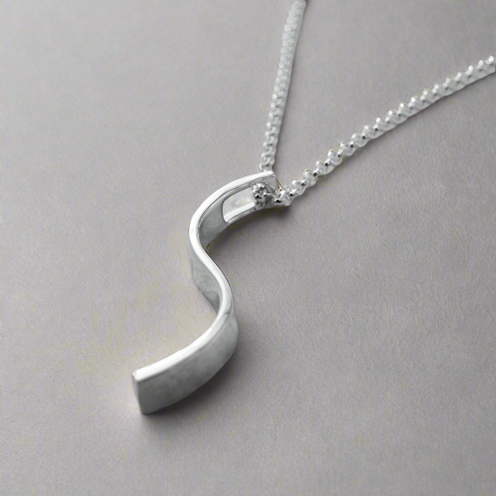 AYA_-_S_Bar_Silver_Pendant_PHP0028.16_6 Ireland jewellery
AYA - S Bar Silver Pendant Curated and designed by Emilio Sotelo Jewelry for Croi Kinsale Jewellery in Kinsale West Cork Ireland Europe. Find exceptional handmade silver and gold jewellery at affordable prices for birthday gifts and Christmas presents. Find Irish designers and makers. Beautiful jewellery shop located in Kinsale, Co. Cork.