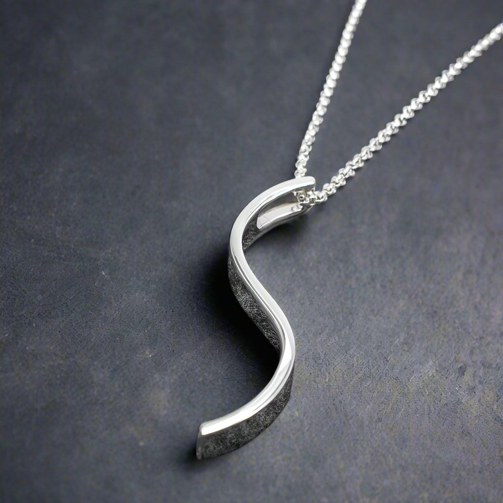 AYA_-_S_Bar_Silver_Pendant_PHP0028.16_6 Ireland jewellery
AYA - S Bar Silver Pendant Curated and designed by Emilio Sotelo Jewelry for Croi Kinsale Jewellery in Kinsale West Cork Ireland Europe. Find exceptional handmade silver and gold jewellery at affordable prices for birthday gifts and Christmas presents. Find Irish designers and makers. Beautiful jewellery shop located in Kinsale, Co. Cork.