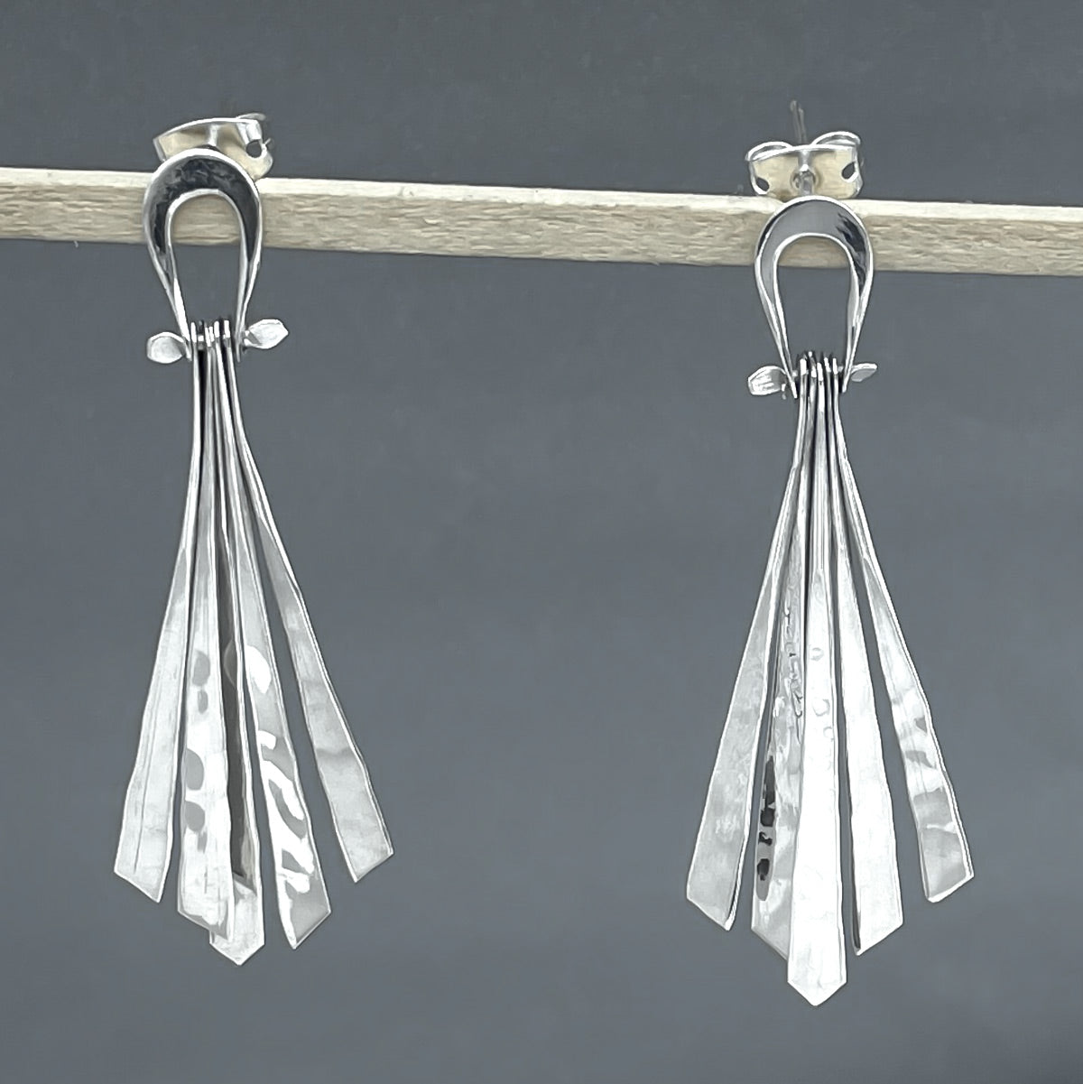 Áine Luminous Dangling Diamond-Shape Hammered Silver Stud Earrings