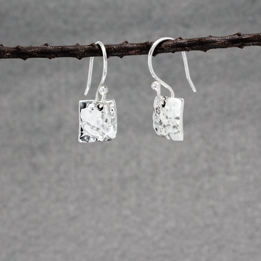 Small Artemis Hammered Square Silver Earrings Dangle  Details:  Dimensions: 10 mm long by 10 mm wide (approximately 3/8 inches long by 3/8 inches wide) Sterling silver French wire Material: .950 sterling silver Finish: Hammered silver