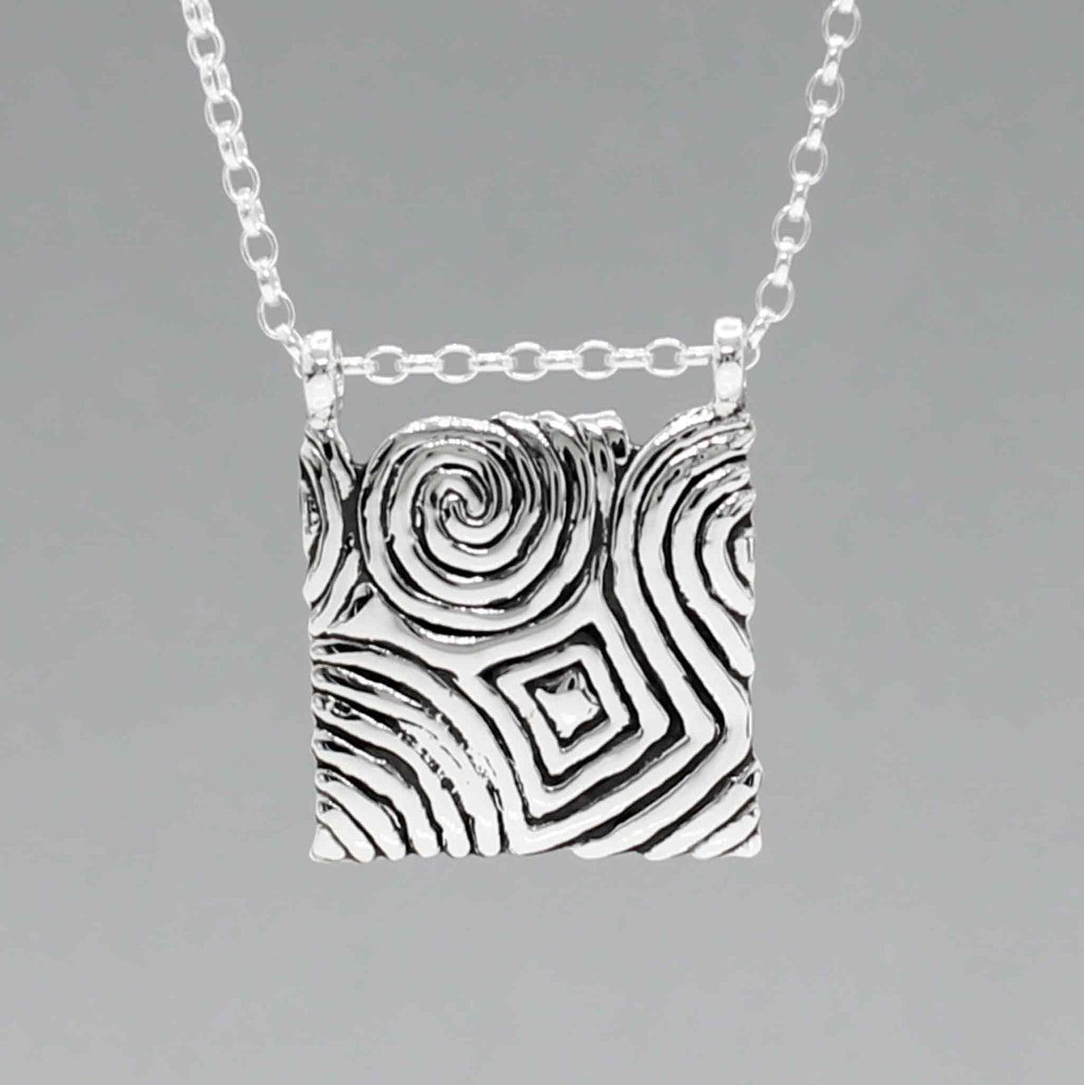 Éire Cropped Square from Newgrange Stone Silver Pendant