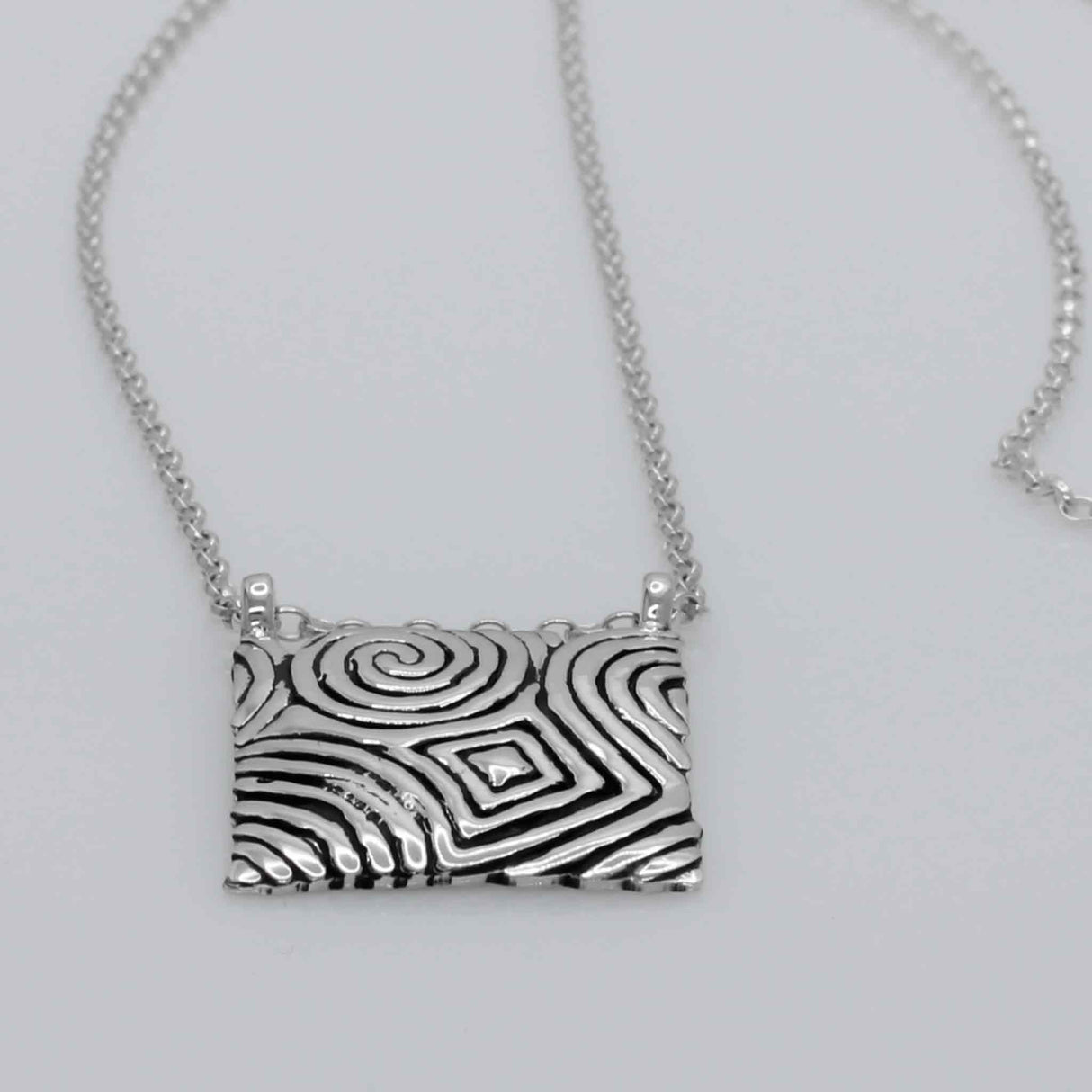 Éire Cropped Square from Newgrange Stone Silver Pendant