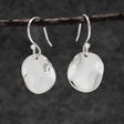 Selene Wavy Disc Silver Dangle Earrings,Ê Shop affordable, high-quality jewellery in Kinsale, West Cork, Ireland designed by