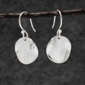 Selene Wavy Disc Silver Dangle Earrings,Ê Shop affordable, high-quality jewellery in Kinsale, West Cork, Ireland designed by
