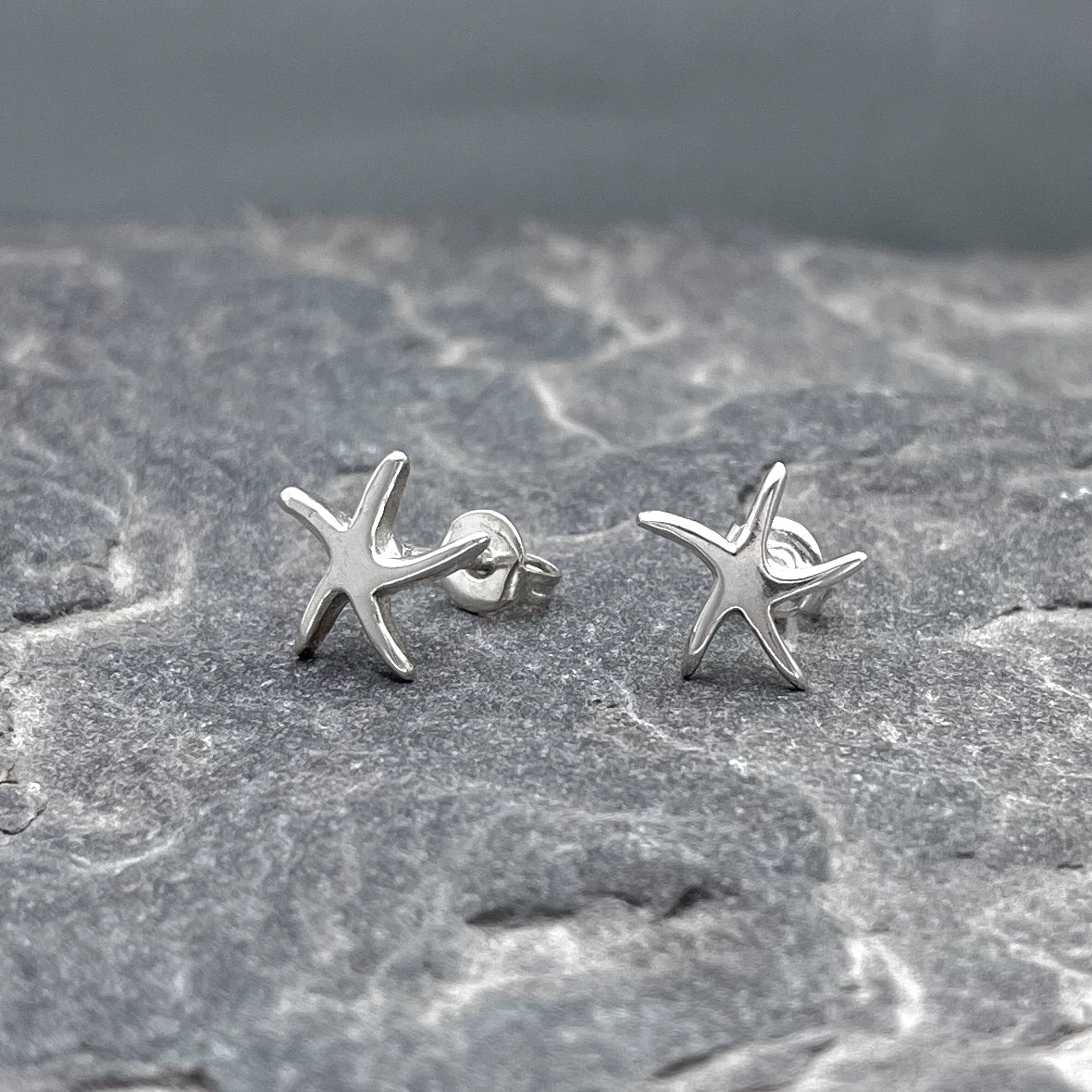 Uisce Tiny Starfish Silver Stud Earrings
