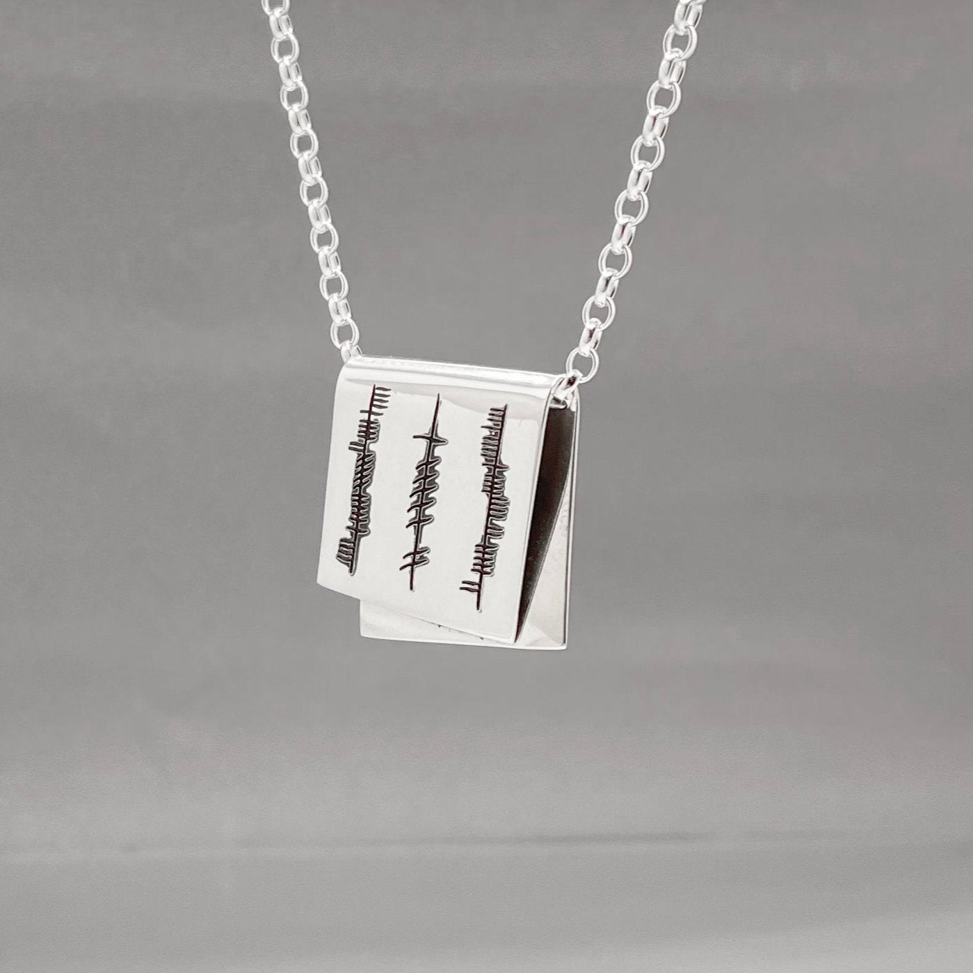 Éire Grá, Cairdeas & Dílseacht – Ogham Papyrus Silver Pendant