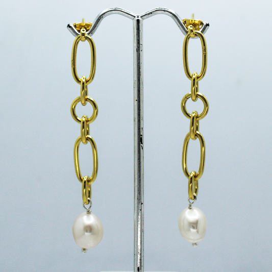 Stunningly crafted, Pearla's 24k Gold-filled Silver Earrings with White Fresh Water Pearl - Stud make a compelling statement. With a length of 70mm and a width of 7mm, these earrings are sure to stand out. Plus, the fresh water pearls are 10mm wide and 13mm long, adding an extra special touch. As these pearls are all natural, slight variations can occur.