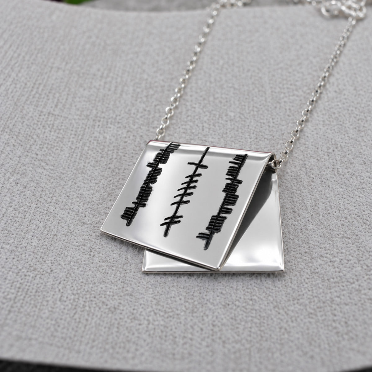Éire Grá, Cairdeas & Dílseacht Ogham Papyrus Silver Pendant