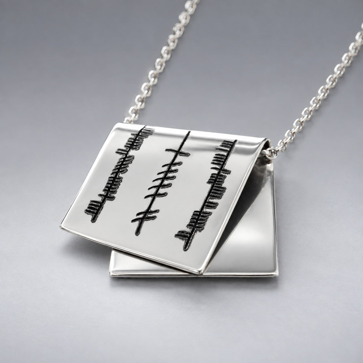 Éire Grá, Cairdeas & Dílseacht Ogham Papyrus Silver Pendant