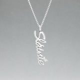 Eire - Sláinte (Health) Silver Pendant  Dimensions: 12mm wide x 37mm long, 1mm thick Chain: 1.7mm sterling silver rolo chain included Material: Made with sterling silver Design: Featuring the word "Sláinte" in italic font Style: Unisex Celebrate health and well-being with our elegant Eire - Sláinte Silver Pendant. This beautifully crafted piece is perfect for anyone who appreciates fine Irish jewellery. Select chain length below.