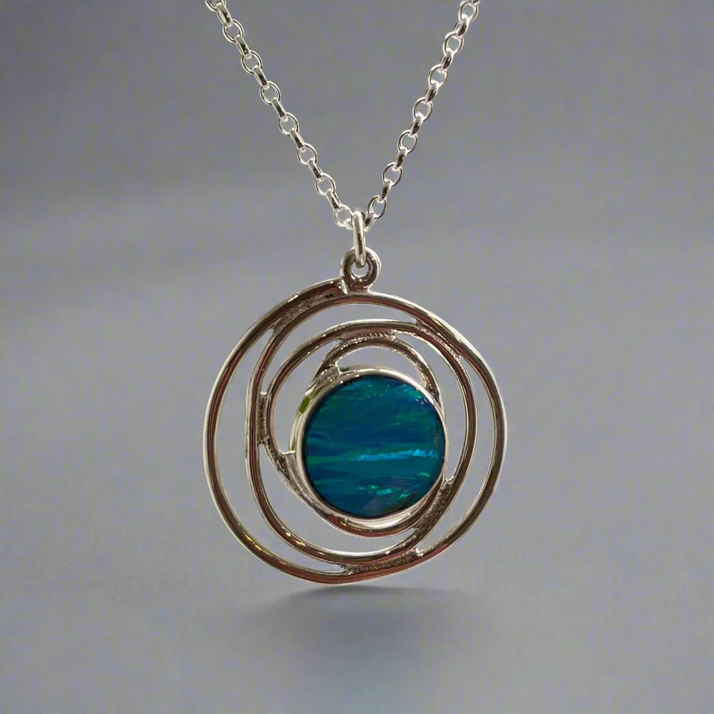 Tara - Blue Opalesce in Spiral Frame Small Silver Pendant