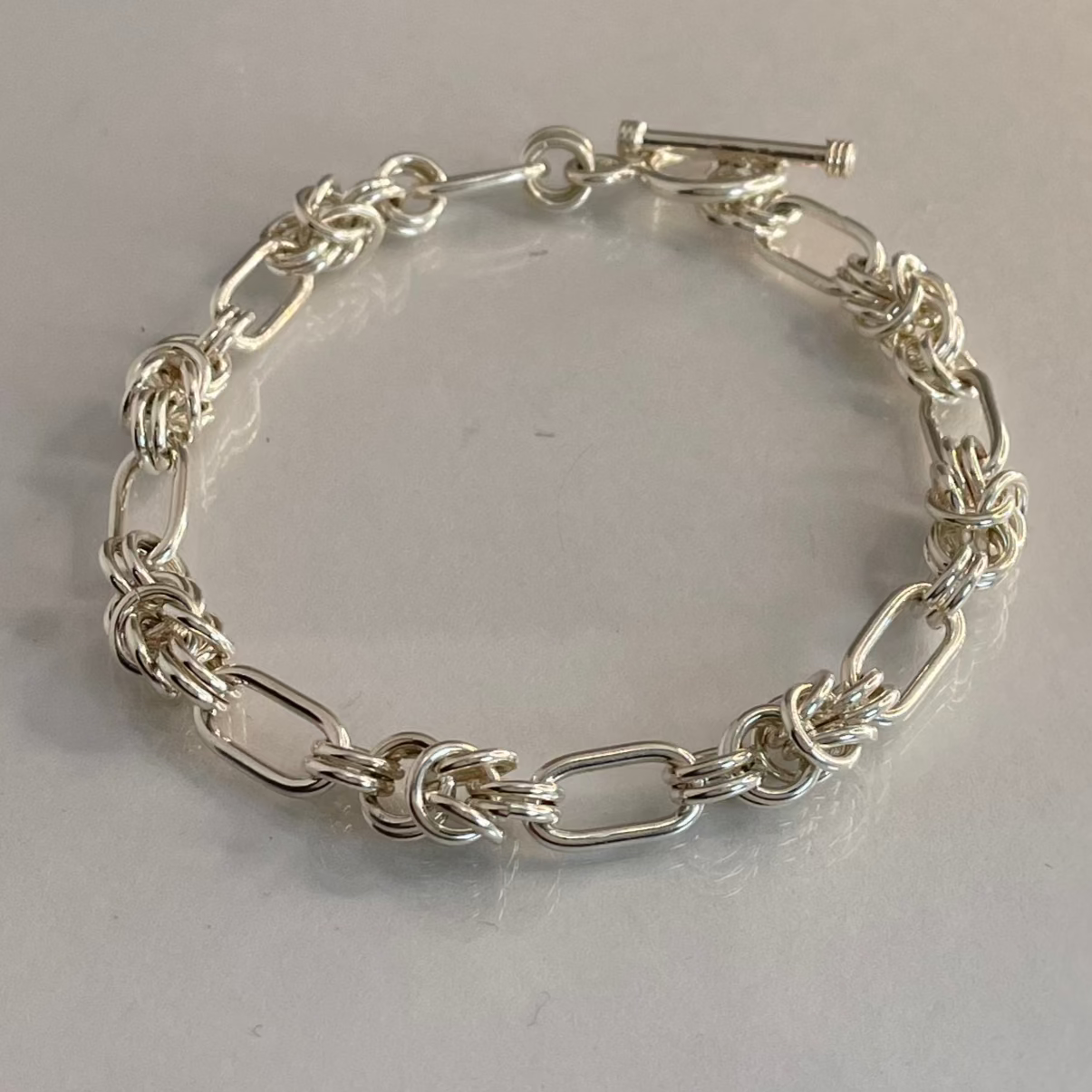 Áine - Interlaced Rings and Oval Link Silver Bracelet