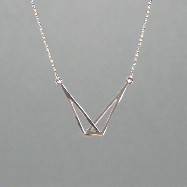 Le Chéile Triangle Linked Silver Pendant by Miriam Wade Jewellery. 